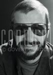 04-10-1976 Ringo Starr at studio in Amsterdam.

[keywords]Black & White Image, Headshot, Eyecontact, Sunglasses, Smiling[/keywords]